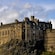 Las murallas de piedra, la fortaleza exterior y el edificio principal del Castillo de Edimburgo en Escocia